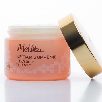 Pot crème Melvita laqué couleur saumon + décor encre + couvercle doré